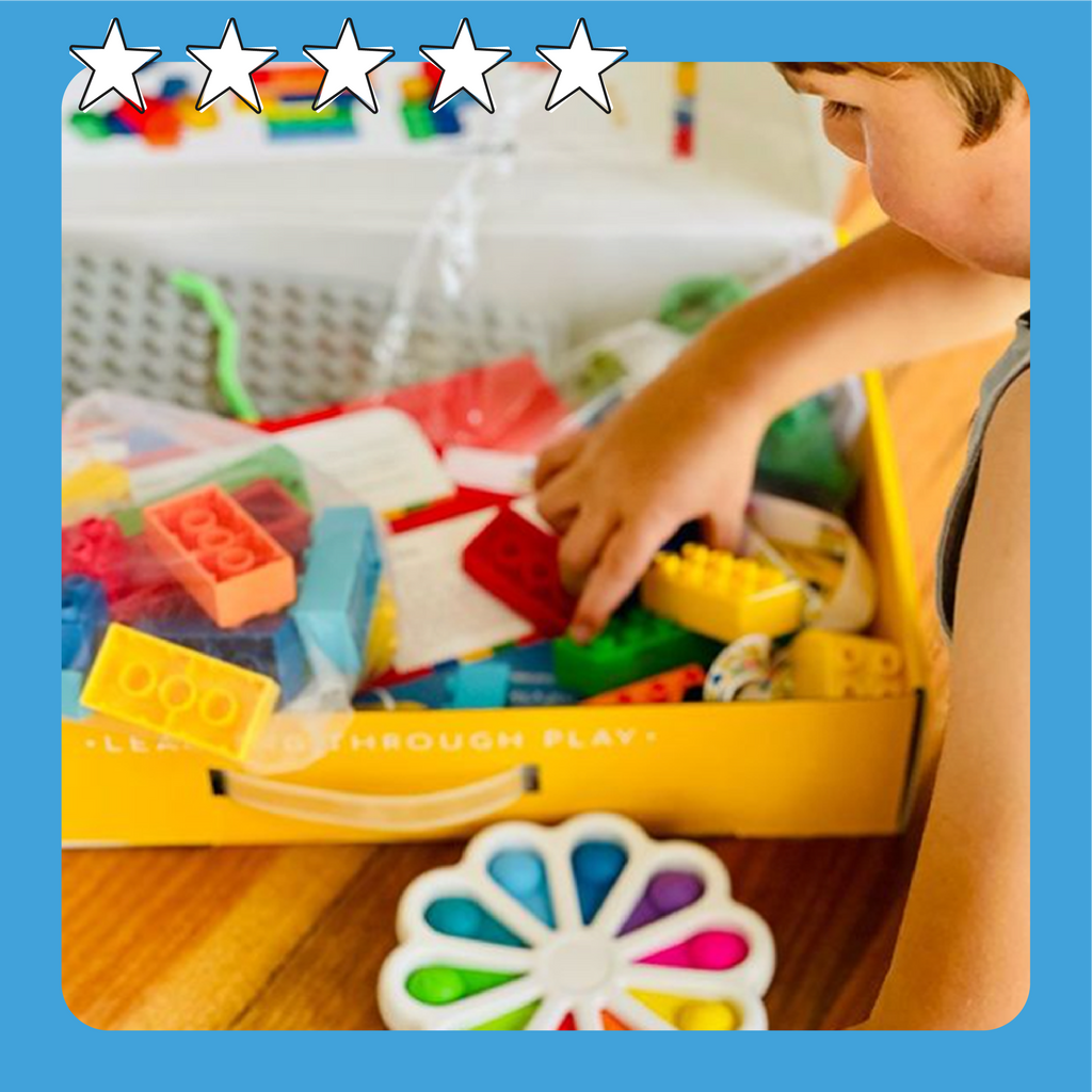Kid aged around 4 years old playing with our ultimate educational toy