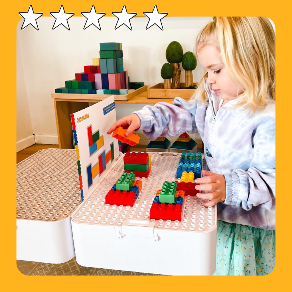A kid aged around 3 years old playing with our patterning mats